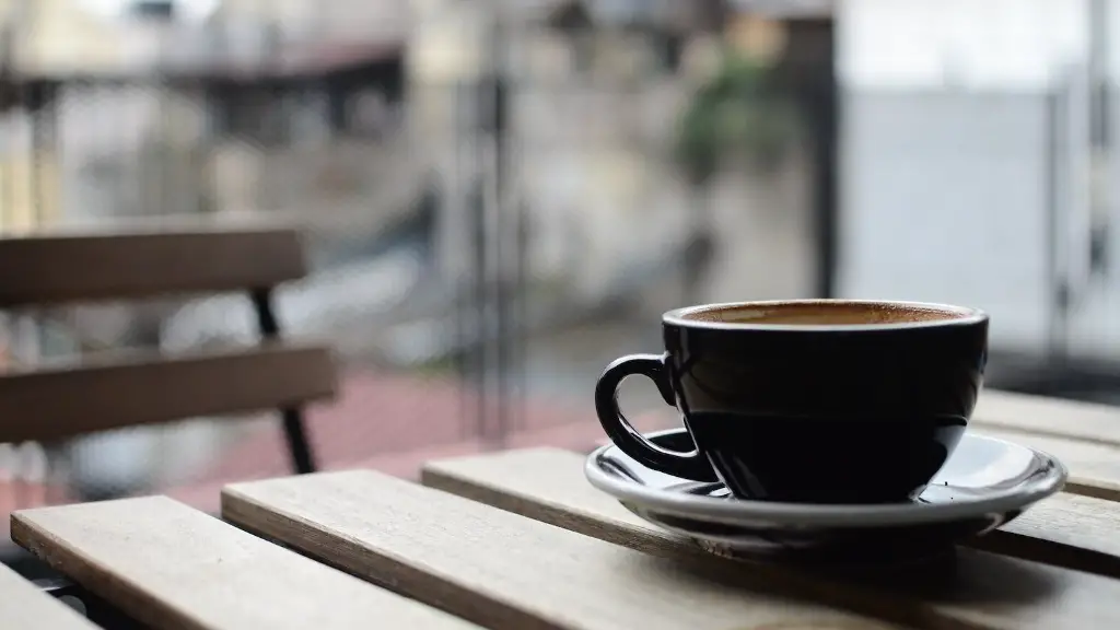 A Fisherman In A Boat Is Drinking Hot Coffee